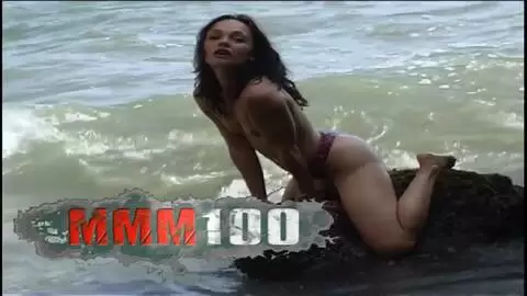 Young touching herself at the beach