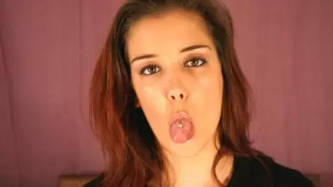 Pornstar teen Cynthia Lavigne doing a hot striptease on the bed 