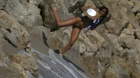 Hot brazilian girl stripping in the beach