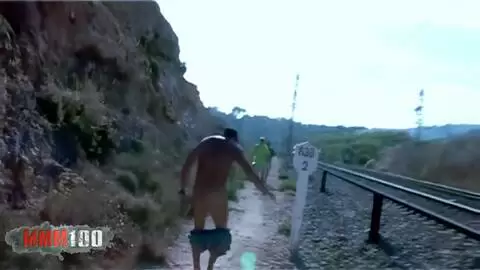 Jorge Fernandez shows his butt on the train tracks