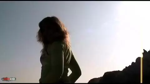 Mature slut giving a blowJob on the beach