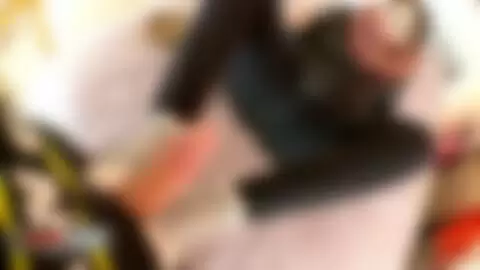 Cute young brunette in tight leggings giving footjob