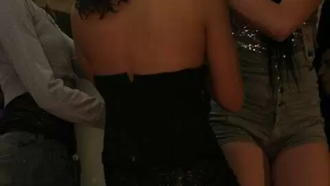 Three horny bitches flashing in a nightclub