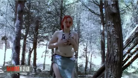 Big tits babe with red hair nude in the forest
