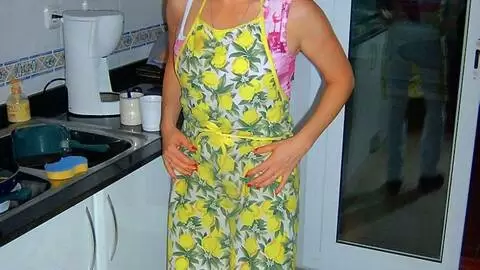 Pretty blonde Tigra getting naked in the kitchen 