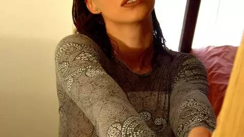 Pretty young redhead Vega doing a strip in the stairs 