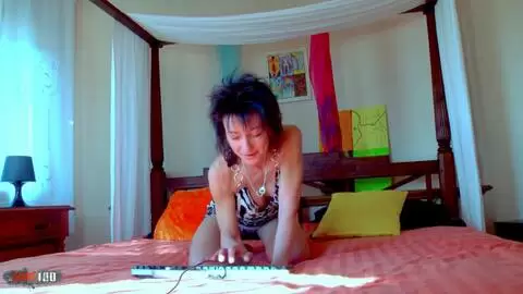 Beautiful mature brunette Zaza La Coquine getting naked on her webcam 