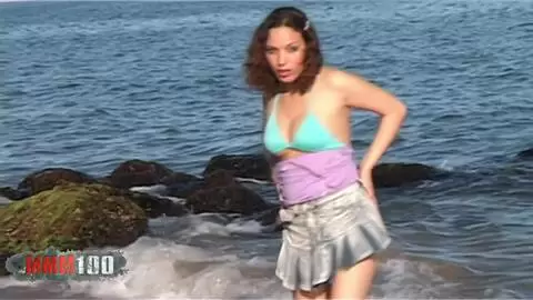 Sexy wet teen in the sea making a hot strip